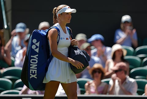 Katie Swan of Britain enters the court to play against Madison Keys of the United States in their second round women's singles match at the Wimbledon Tennis Championships in London, Thursday, July 2, 2026. 