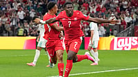 (AP Photo/Lindsey Wasson) : Switzerland's Breel Embolo (7) celebrates after scoring his team's first goal during the World Cup round of 32 soccer match between Switzerland and Algeria in Vancouver, British Columbia, Thursday, July 2, 2026