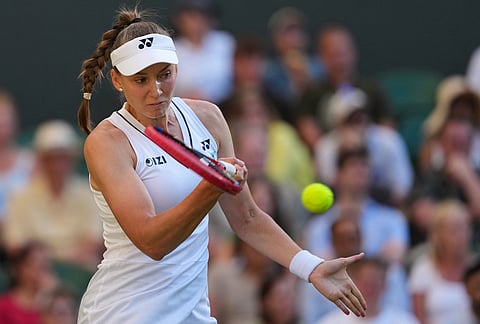 Elena Rybakina of Kazakhstan plays a return during the second round women's singles match against Caty Mcnally of the United States at the Wimbledon Tennis Championships in London, Thursday, July 2, 2026.
