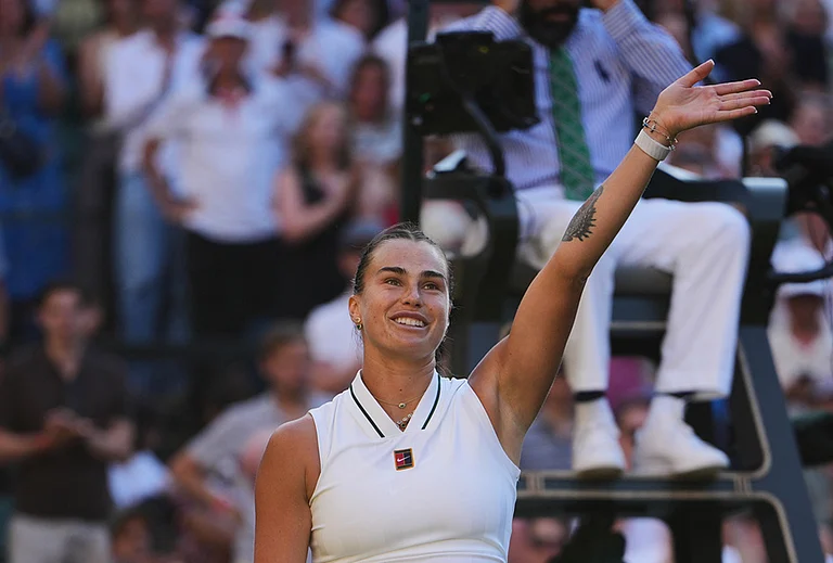 Aryna Sabalenka of Belarus celebrates her victory against Jelena Ostapenko of Latvia in their third round women's singles match at the Wimbledon Tennis Championships in London, Friday, July 3, 2026. - | Photo: AP/Kin Cheung