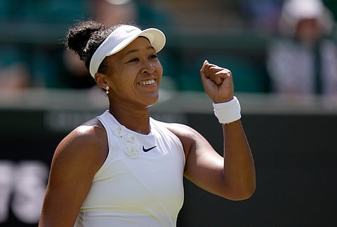Naomi Osaka of Japan celebrates winning the third round women's singles match against Daria Kasatkina of Australia at the Wimbledon Tennis Championships in London, Friday, July 3, 2026.