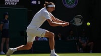 | Photo: AP/Maja Smiejkowska : Alexander Zverev of Germany returns the ball to Valentin Royer of France in their second round men's singles match at the Wimbledon Tennis Championships in London, Thursday, July 2, 2026. 