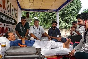 | Photo: PTI/Karma Bhutia : Climate activist and educationist Sonam Wangchuk interacts with a medical professional as Cockroach Janata Party (CJP) founder Abhijeet Dipke looks on during a hunger strike by CJP demanding action over alleged irregularities in examinations and seeking the resignation of Union Education Minister Dharmendra Pradhan, at Jantar Mantar, in New Delhi. Wangchuk is on the seventh day of his indefinite hunger strike in support of the youth-led protest.