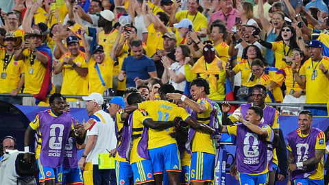 Colombia's Jhon Arias (11) celebrates with teammates after scoring their first goal during the World Cup round of 32 soccer match between Colombia and Ghana in Kansas City, Mo., Friday, July 3, 2026. 