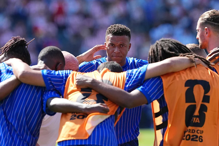 France's Kylian Mbappe (10) looks on ahead of the World Cup round of 16 soccer match between Paraguay and France - AP/Martin Meissner