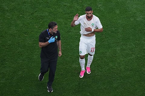 Morocco's Ismael Saibari (11) walks off the pitch due to an injury during the World Cup round of 16 soccer match between Canada and Morocco in Houston