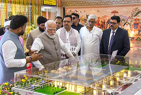 Prime Minister Narendra Modi, Rajasthan Governor Haribhau Bagde, Union Civil Aviation Minister K Rammohan Naidu, Union Culture and Tourism Minister Gajendra Singh Shekhawat, Chief Minister Bhajanlal Sharma and others during the inauguration of the new terminal building of Jodhpur Airport, in Rajasthan. 
