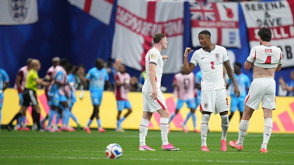 England players react after Congo's Brian Cipenga (9) opening goal of his team during the World Cup round of 32 soccer match between England and Congo in Atlanta - AP Photo/Jacob Kupferman