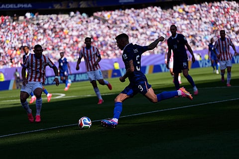 France's Lucas Digne (3) plays a cross during the World Cup round of 16 soccer match
