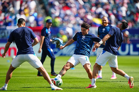 Paraguay's Mauricio, center, goes for the ball during warmup before the World Cup round of 16 soccer match between Paraguay and France in Philadelphia