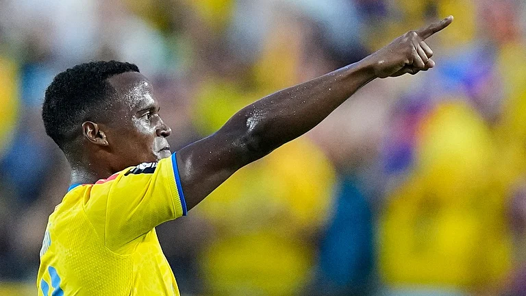 Colombia's Jhon Arias (11) reacts after scoring his team's first goal during the World Cup round of 32 soccer match between Colombia and Ghana in Kansas City, Mo., Friday, July 3, 2026. - AP Photo/Charlie Riedel