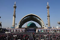 | Photo: AP/Altaf Qadri : The coffins of the late Iranian Supreme Leader Ayatollah Ali Khamenei and members of his family are displayed on a stand at the start of the dayslong funeral ceremonies at the Imam Khomeini Mosalla Grand Mosque in Tehran, Iran.