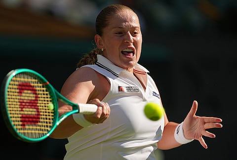 Jelena Ostapenko of Latvia returns the ball to Aryna Sabalenka of Belarus in their third round women's singles match at the Wimbledon Tennis Championships in London, Friday, July 3, 2026. 
