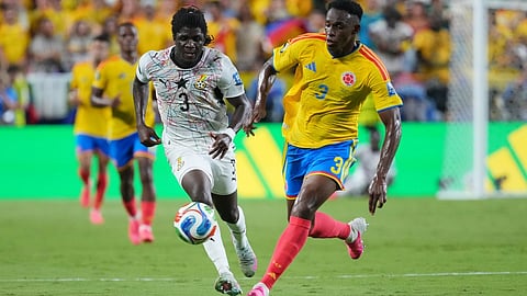 Ghana's Caleb Yirenkyi, left, and Colombia's Jhon Lucumi, right, battle for the ball during the World Cup round of 32 soccer match between Colombia and Ghana in Kansas City, Mo., Friday, July 3, 2026.
