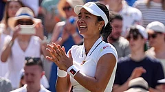 Alexandra Eala of the Philippines celebrates winning the third round women's singles match against Iga Swiatek of Poland at the Wimbledon Tennis Championships in London, Saturday, July 4, 2026 - (AP Photo/Maja Smiejkowska)