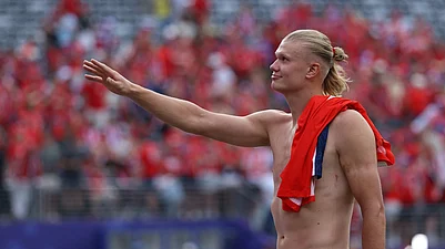 Pamela Smith/AP Photo : Norways Erling Haaland (9) celebrates after the World Cup round of 16 soccer match between Brazil and Norway in East Rutherford, N.J., near New York