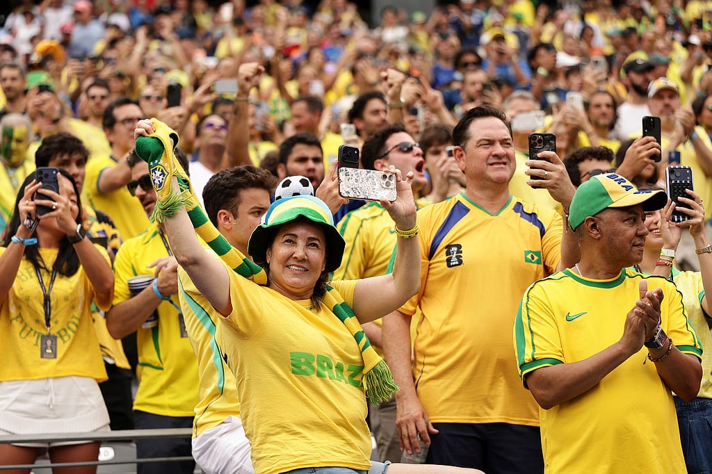 Fans of Brazil cheer from the stands ahead of the World Cup round of 16 soccer match between Brazil and Norway in East Rutherford, 