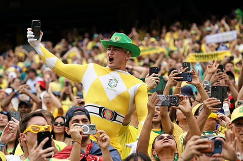 Fans of Brazil cheer from the stands ahead of the World Cup round of 16 soccer match between Brazil and Norway in East Rutherford
