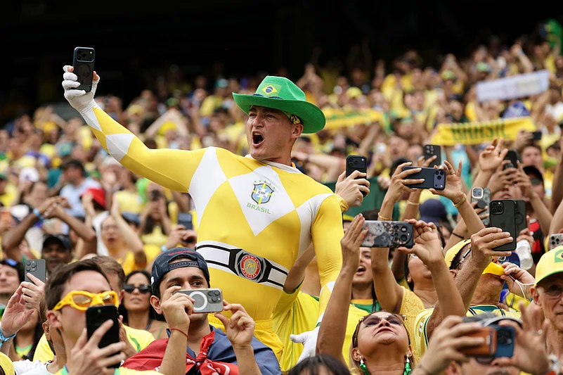 Fans of Brazil cheer from the stands ahead of the World Cup round of 16 soccer match between Brazil and Norway in East Rutherford