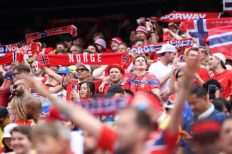Fans cheer during the World Cup round of 16 soccer match between Brazil and Norway in East Rutherford