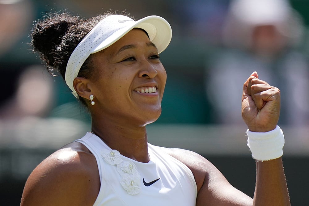 Naomi Osaka of Japan celebrates winning the third round women's singles match against Daria Kasatkina of Australia at the Wimbledon Tennis Championships in London. - | Photo: AP/Brian Inganga