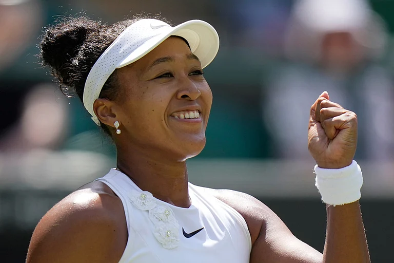 Naomi Osaka of Japan celebrates winning the third round women's singles match against Daria Kasatkina of Australia at the Wimbledon Tennis Championships in London. - | Photo: AP/Brian Inganga