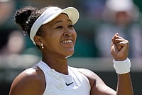| Photo: AP/Brian Inganga : Naomi Osaka of Japan celebrates winning the third round women's singles match against Daria Kasatkina of Australia at the Wimbledon Tennis Championships in London.
