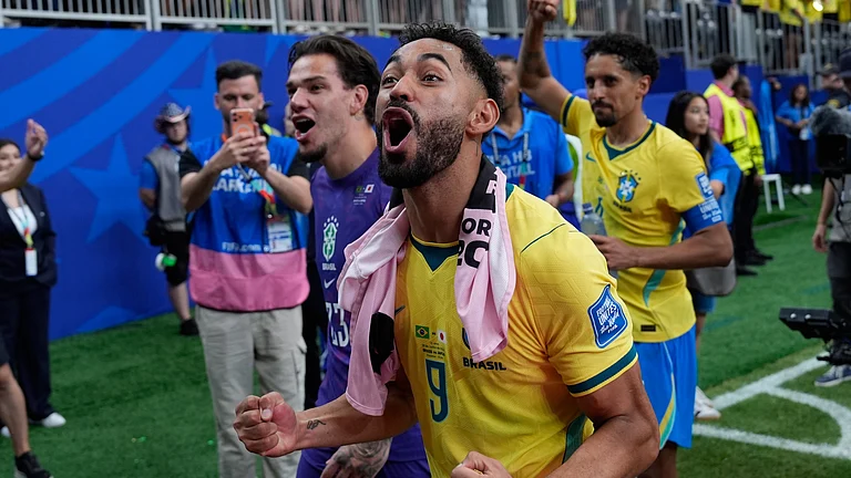Brazil's Matheus Cunha (9) celebrates after the World Cup round of 32 soccer match between Brazil and Japan in Houston, Monday, June 29, 2026. - (AP Photo/David J. Phillip)