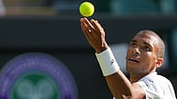 Auger-Aliassime Vs Davidovich Fokina Live Score, Wimbledon: Canadian Star Battles Spanish Rival For QF Spot | Photo: AP/Kin Cheung : Felix Auger-Aliassime of Canada serves against Dino Prizmic of Croatia in their second round men's singles match at the Wimbledon Tennis Championships in London, Wednesday, July 1, 2026.