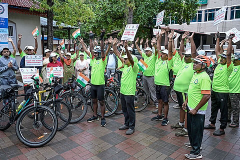 Shivamogga Zilla Panchayat CEO Hemanth N, and other officials, participate in a walkathon to create awareness about the Special Intensive Revision (SIR) of electoral rolls, in Shivamogga, Karnataka.