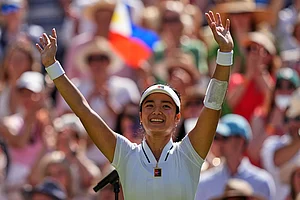 | Photo: AP/Maja Smiejkowska : Alexandra Eala of the Philippines celebrates winning the third round women's singles match against Iga Swiatek of Poland at the Wimbledon Tennis Championships in London.
