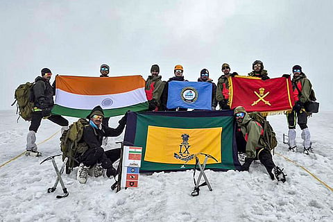 In this image posted on July 5, 2026, Teams of Gajraj Corps, Sela Warriors, and NIMAS scale the Bajrang Peak (5,583m) under the banner of Operation Arunoday.
