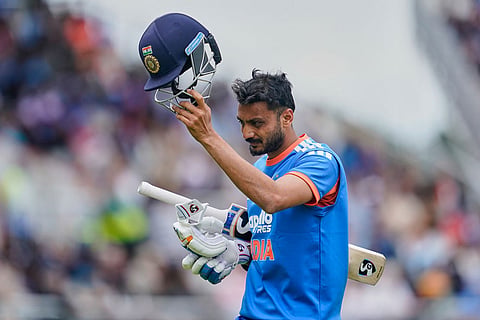 India's Axar Patel leaves the ground after losing his wicket during the second T20 cricket match between England and India in Manchester, England.