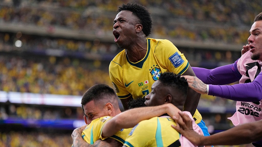 Brazil's Vinicius Junior (7) celebrates the second goal of his team during the World Cup round of 32 soccer match between Brazil and Japan in Houston - AP Photo/Ashley Landis