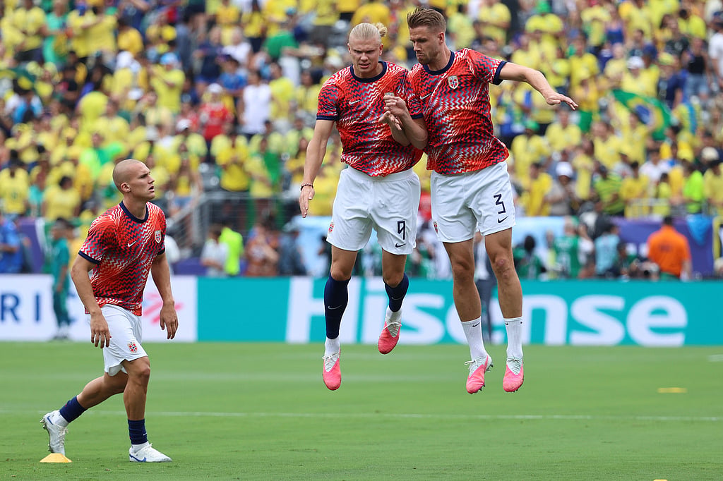 Norways Erling Haaland (9) and Kristoffer Ajer (3) warm up before the World Cup round of 16 soccer match between Brazil and Norway in East Rutherford