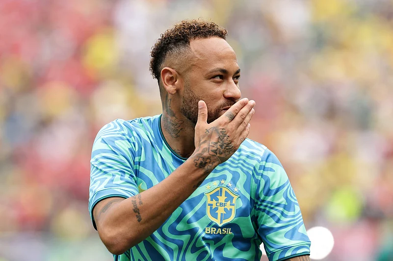 Brazils Neymar (10) gestures during the warm up ahead the World Cup round of 16 soccer match between Brazil and Norway in East Rutherford