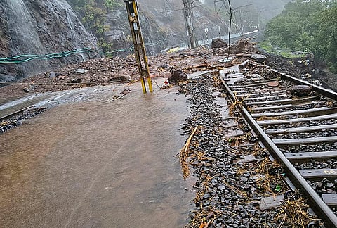 A view of debris after a landslide in the Bhor Ghat section between Karjat and Lonavala, disrupting Mumbai-Pune rail services, in Pune district, Maharashtra. 