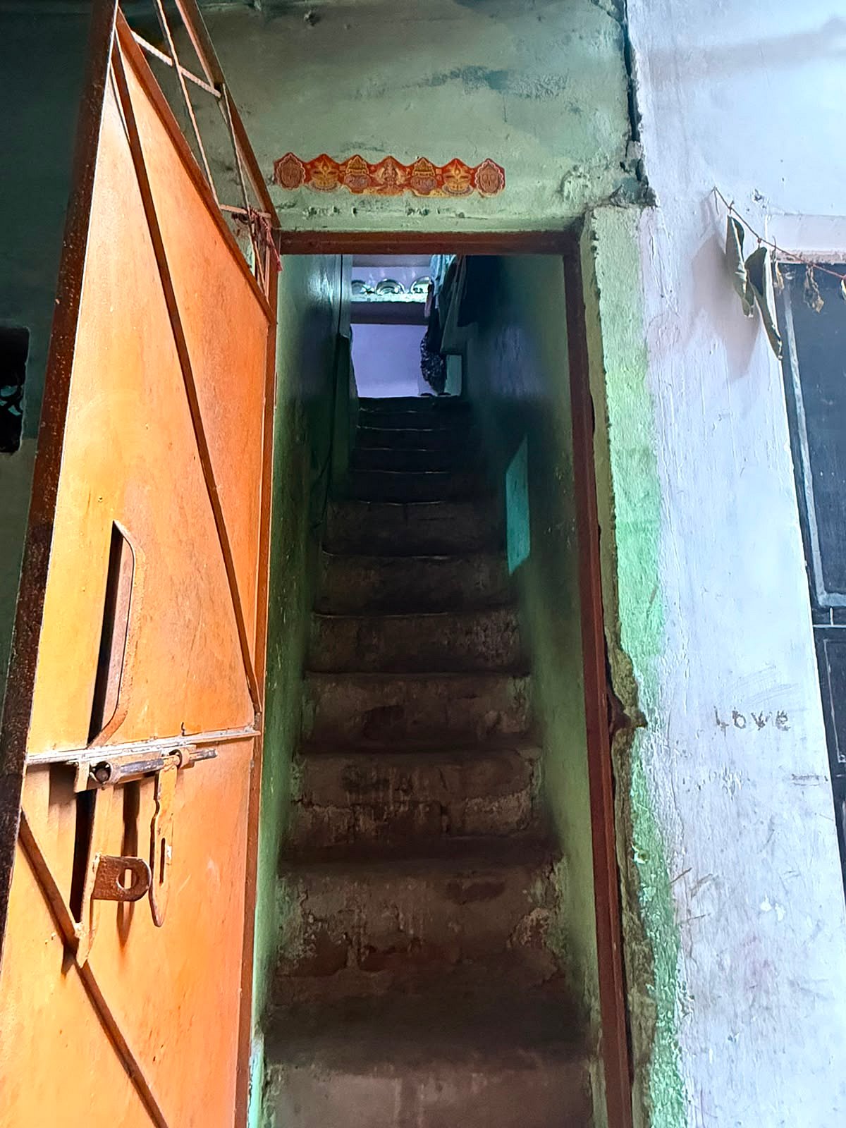 A narrow, dimly lit staircase