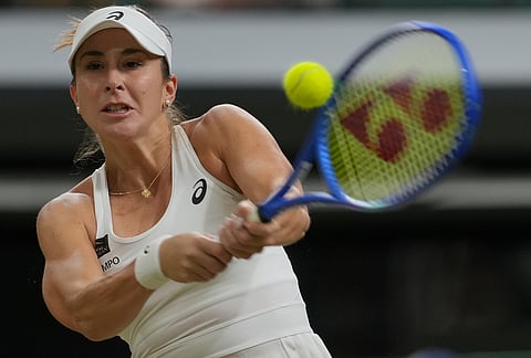 Belinda Bencic of Switzerland returns the ball to Coco Gauff of the United States in their fourth round women's singles match at the Wimbledon Tennis Championships in London, Sunday, July 5, 2026. 
