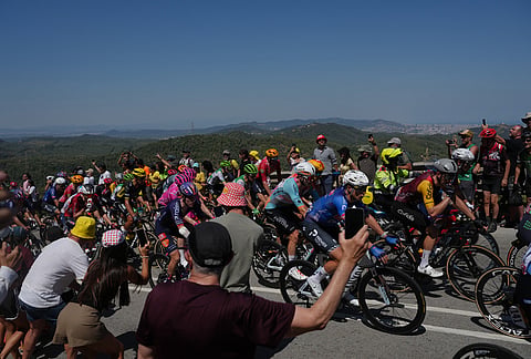 The pack rides during the second stage of the Tour de France cycling race over 168.5 kilometers (104.3 miles) with start in Tarragona and finish in Barcelona, Spain, Sunday, July 5, 2026.
