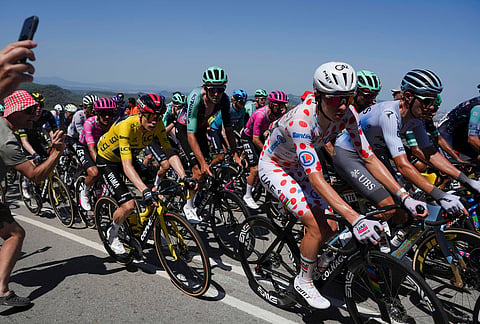 The pack rides during the second stage of the Tour de France cycling race over 168.5 kilometers (104.3 miles) with start in Tarragona and finish in Barcelona, Spain, Sunday, July 5, 2026.