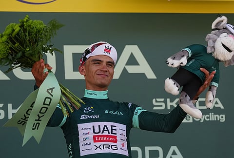 Mexico's Isaac Del Toro wearing the best sprinter's green jersey celebrates on the podium after winning the second stage of the Tour de France cycling race with start in Tarragone and finish in Barcelona, Spain, Sunday, July 5, 2026.