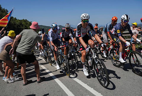 The pack rides during the second stage of the Tour de France cycling race over 168.5 kilometers (104.3 miles) with start in Tarragona and finish in Barcelona, Spain, Sunday, July 5, 2026.