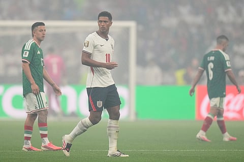 England's Jude Bellingham returns to the pitch for the second half of the World Cup round of 16 soccer match between Mexico and England in Mexico City, Sunday, July 5, 2026