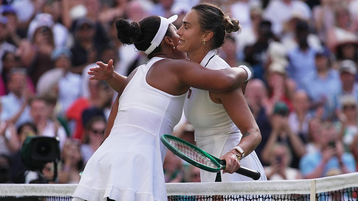 Naomi Osaka of Japan, left, and Aryna Sabalenka of Belarus hug each other at the end of their fourth round women's singles match at the Wimbledon Tennis Championships in London, Sunday, July 5, 2026 - (AP Photo/Brian Inganga)