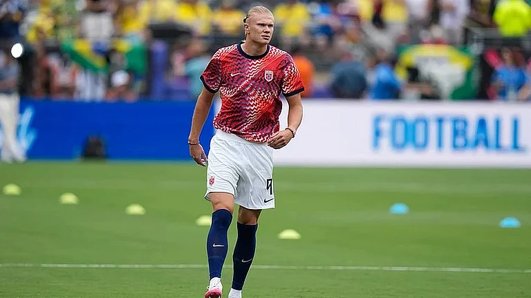 Norway's Erling Haaland (9) walks on the pitch ahead of the World Cup round of 16 soccer match between Brazil and Norway in East Rutherford. - Frank Franklin II/AP Photo