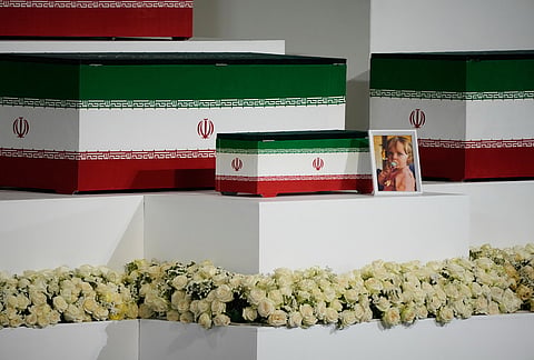 The casket of the late Iranian Supreme Leader Ayatollah Ali Khamenei's granddaughter, Zahra Mohammadi Golpayegani, is displayed alongside the caskets of Khamenei and other members of his family during a viewing ceremony ahead of the dayslong funeral ceremonies at the Imam Khomeini Mosalla Grand Mosque in Tehran, Iran, Friday, July 3, 2026. 