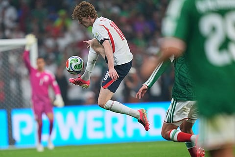 England's Anthony Gordon controls the ball during the World Cup round of 16 soccer match between Mexico and England in Mexico City, Sunday, July 5, 2026