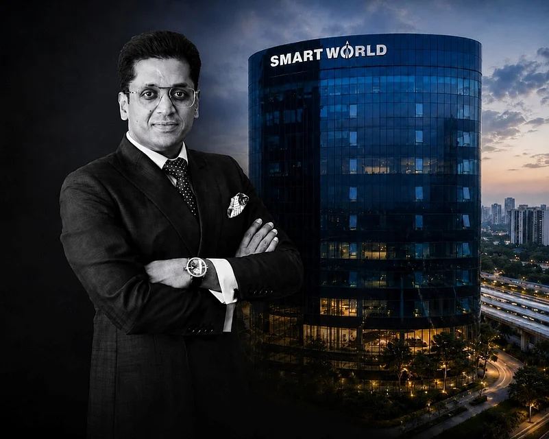 Businessman posing in front of a Smart World building
