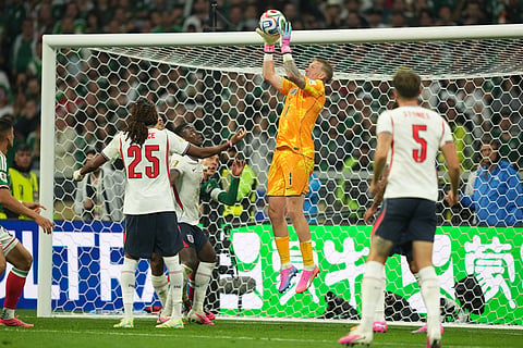 England goalkeeper Jordan Pickford makes a save during the World Cup round of 16 soccer match between Mexico and England in Mexico City, Sunday, July 5, 2026